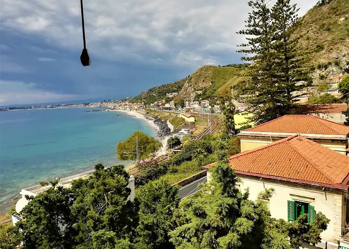 Апартаменты La Baia Dei Delfini